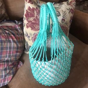 This handbag is handcrafted from natural products